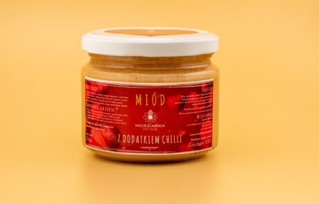 Zdjęcie produktowe, packshot - miód. Zdjęcie produktu do sklepu internetowego.